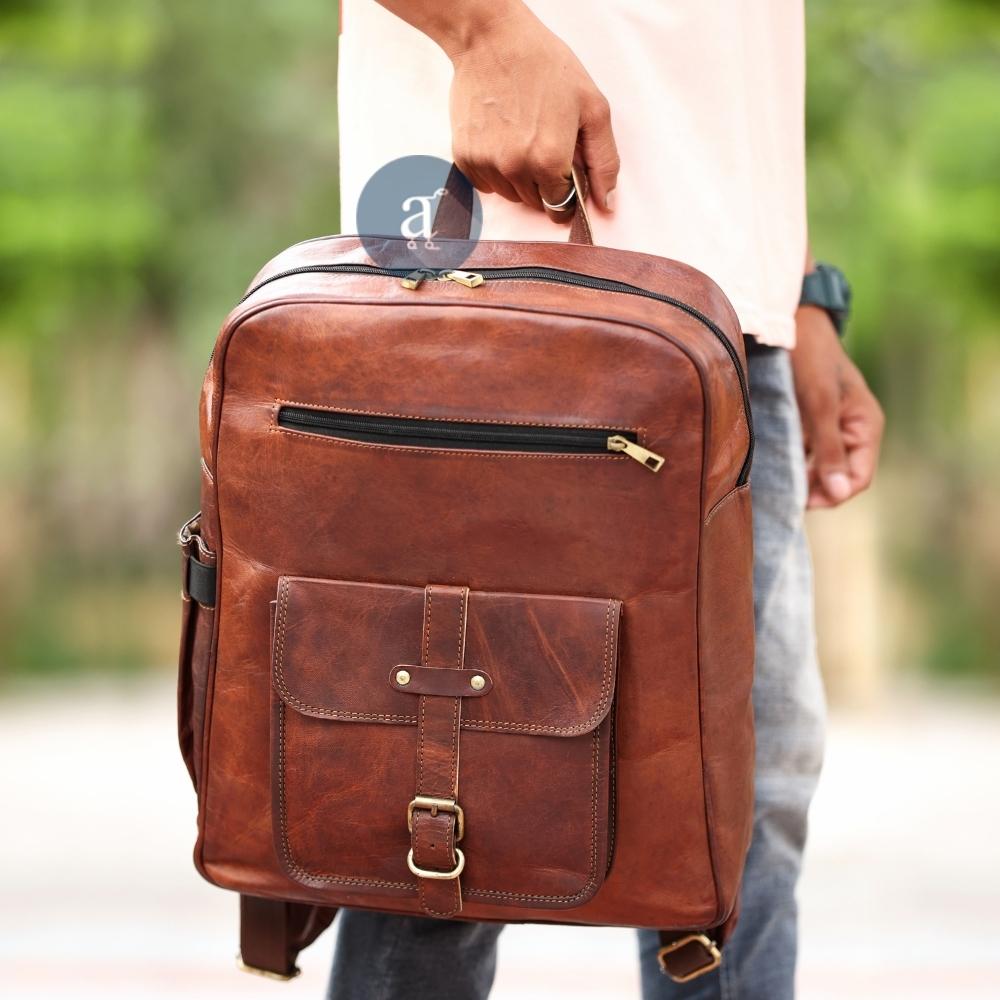 Men Carrying The Envoy with Top Handle