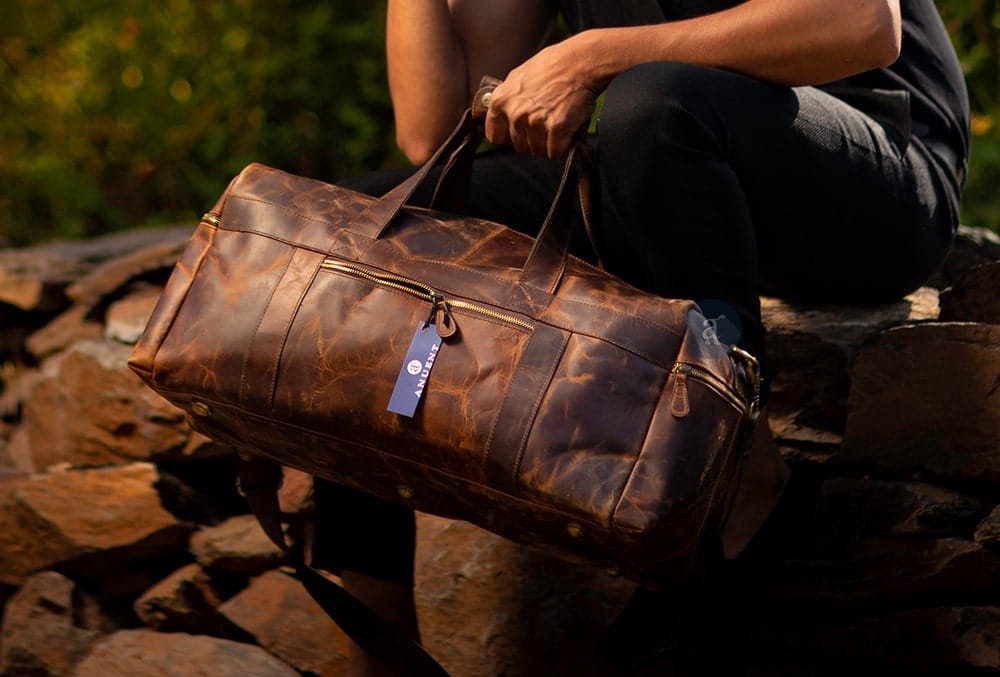 Men Carrying The Traveler