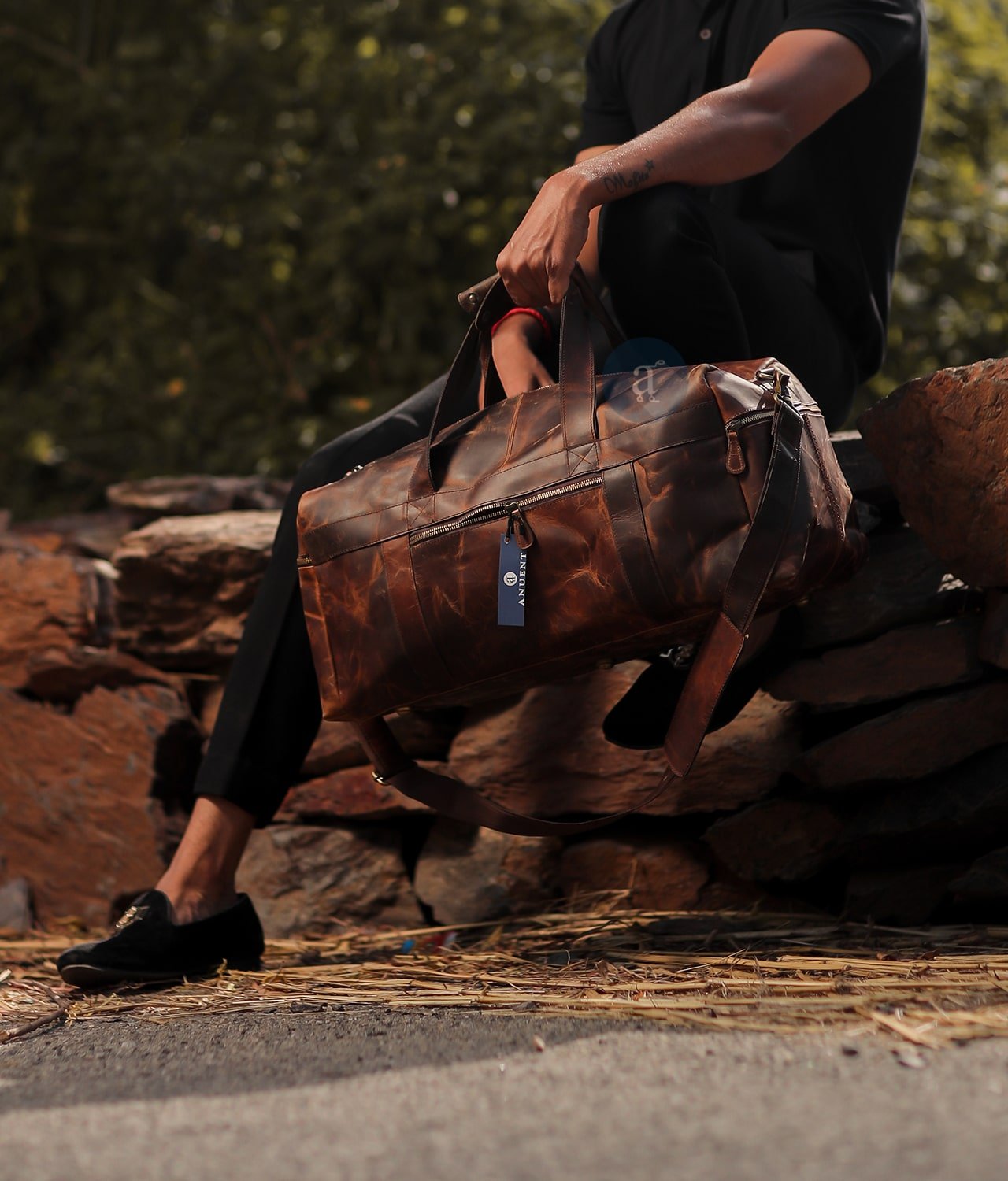 Men Carrying The Traveler from Top Handles